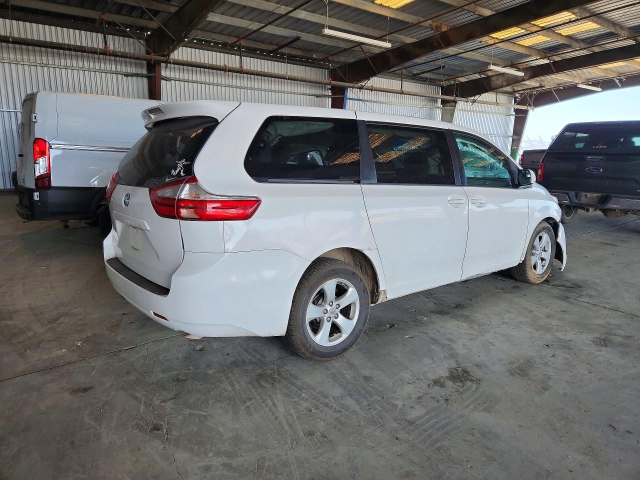 2015 Toyota Sienna L 7-passenger White vin: 5TDZK3DC5FS600753