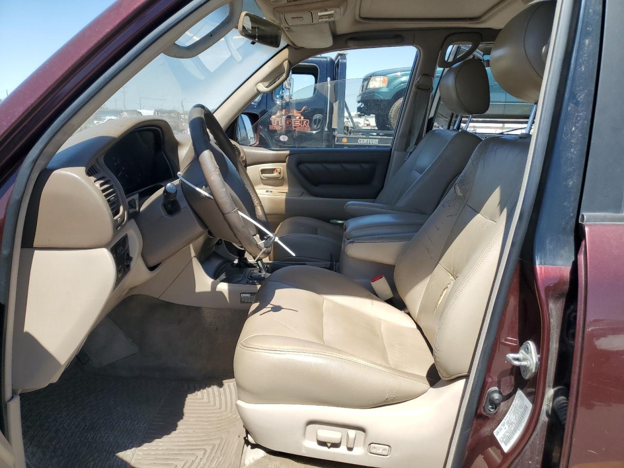 1999 Toyota Land Cruiser    Burgundy vin: JT3HT05JXX0048695