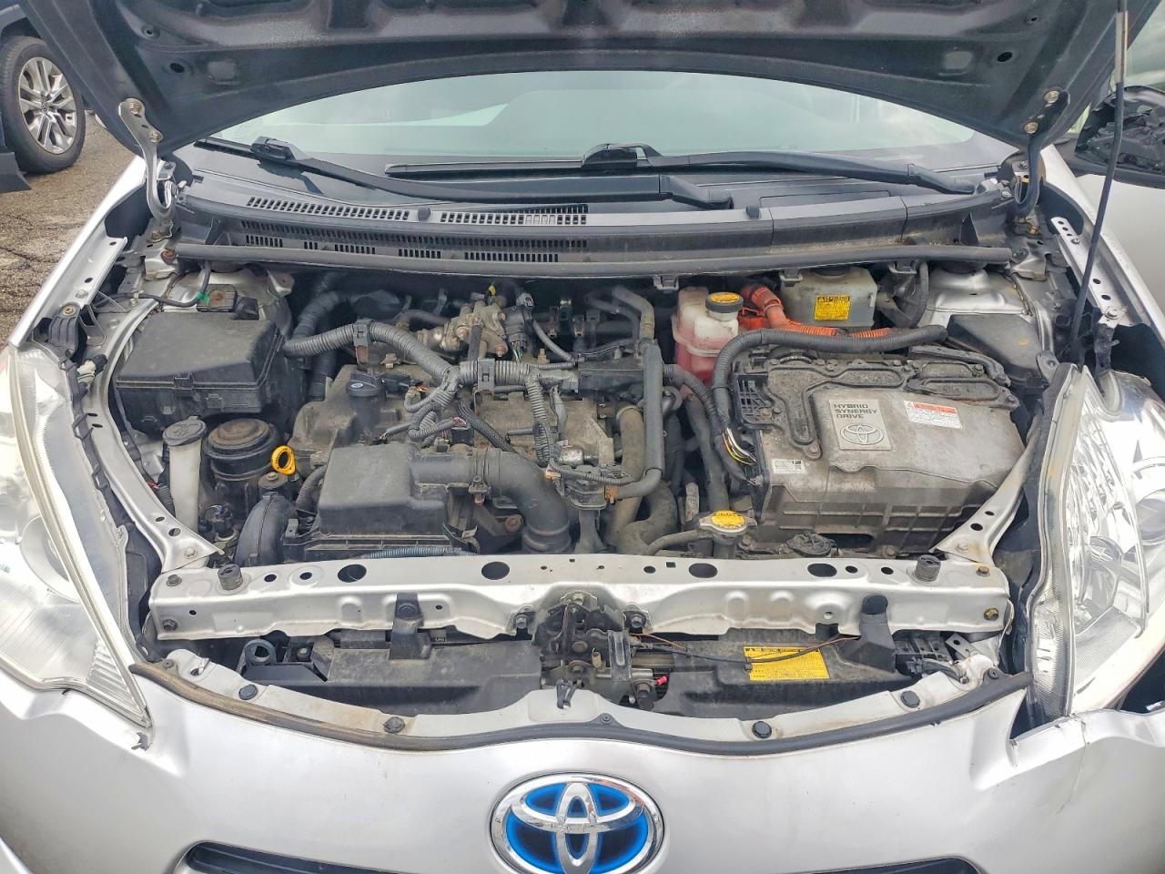 2012 Toyota Prius C Three Серебряный vin: JTDKDTB37C1018872