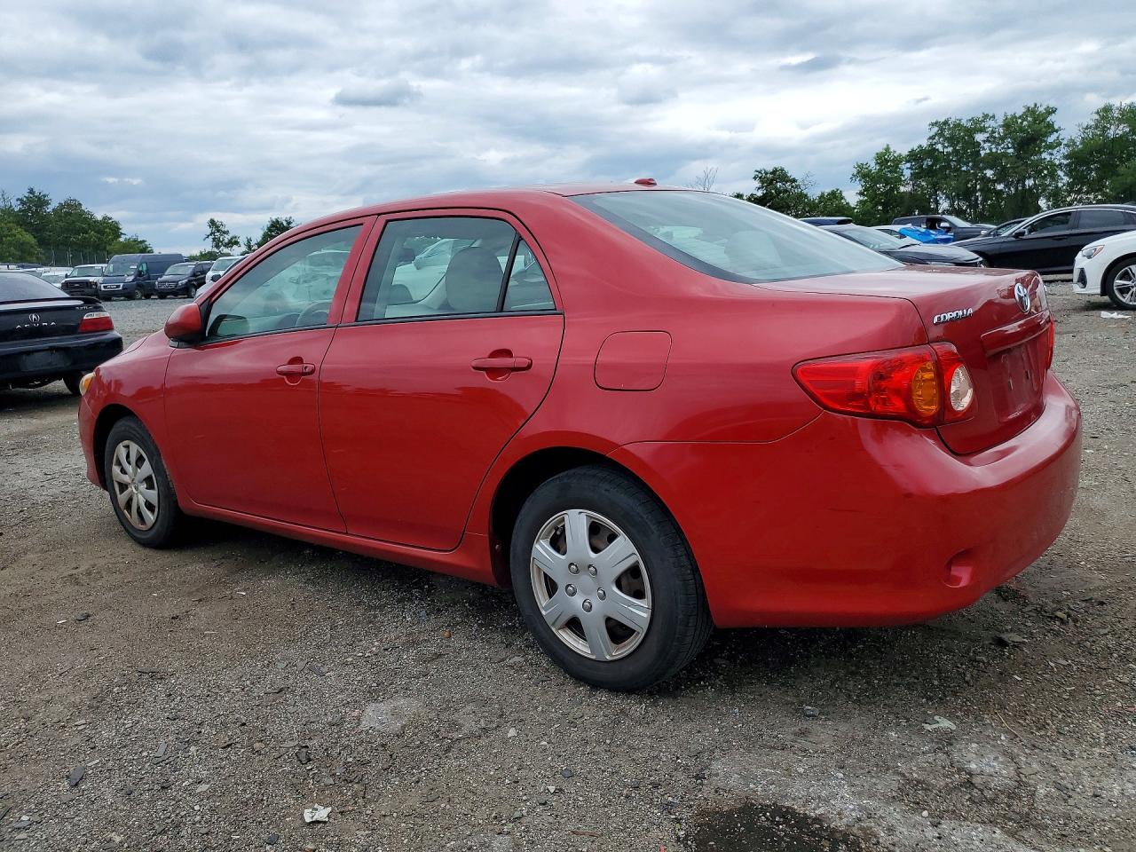 2009 Toyota Corolla Le Red vin: 2T1BU40E19C105715