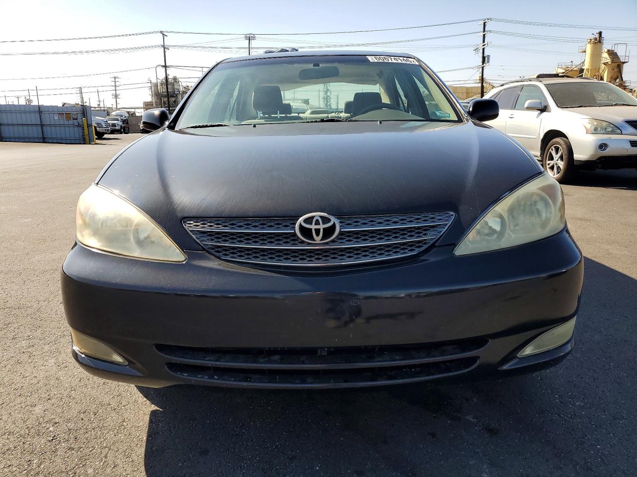 2004 Toyota Camry Le Black vin: JTDBE30K140279025