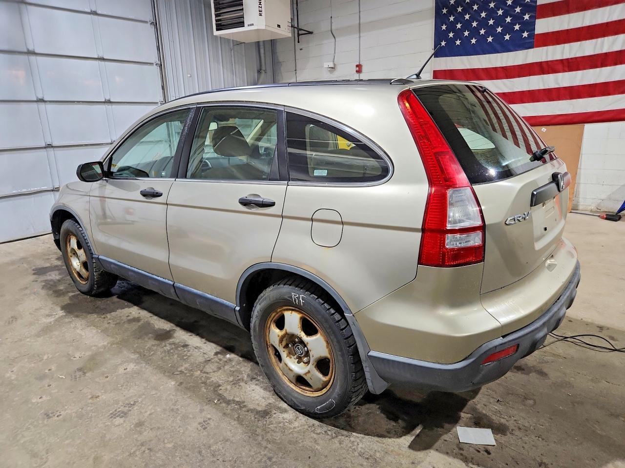 2009 Honda Cr-v Lx Tan vin: JHLRE48349C015582