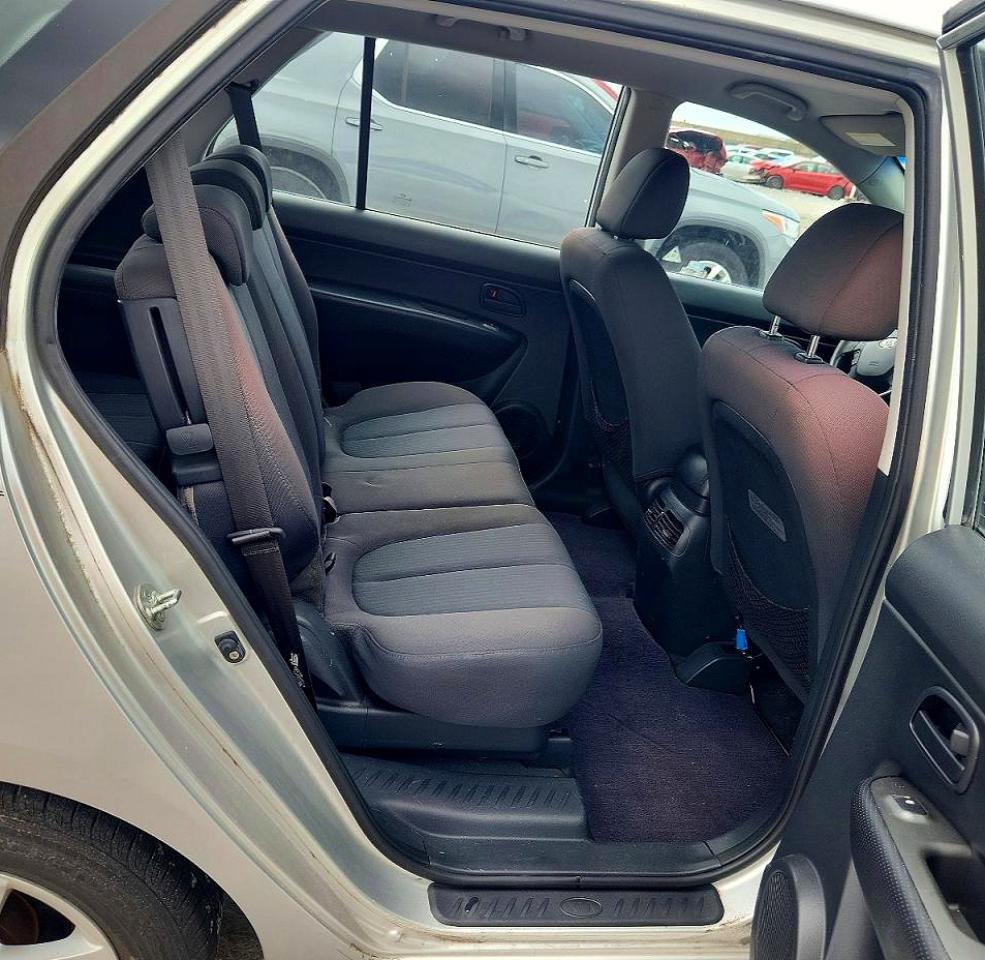 2009 Kia Rondo Base Серебряный vin: KNAFG528797271788