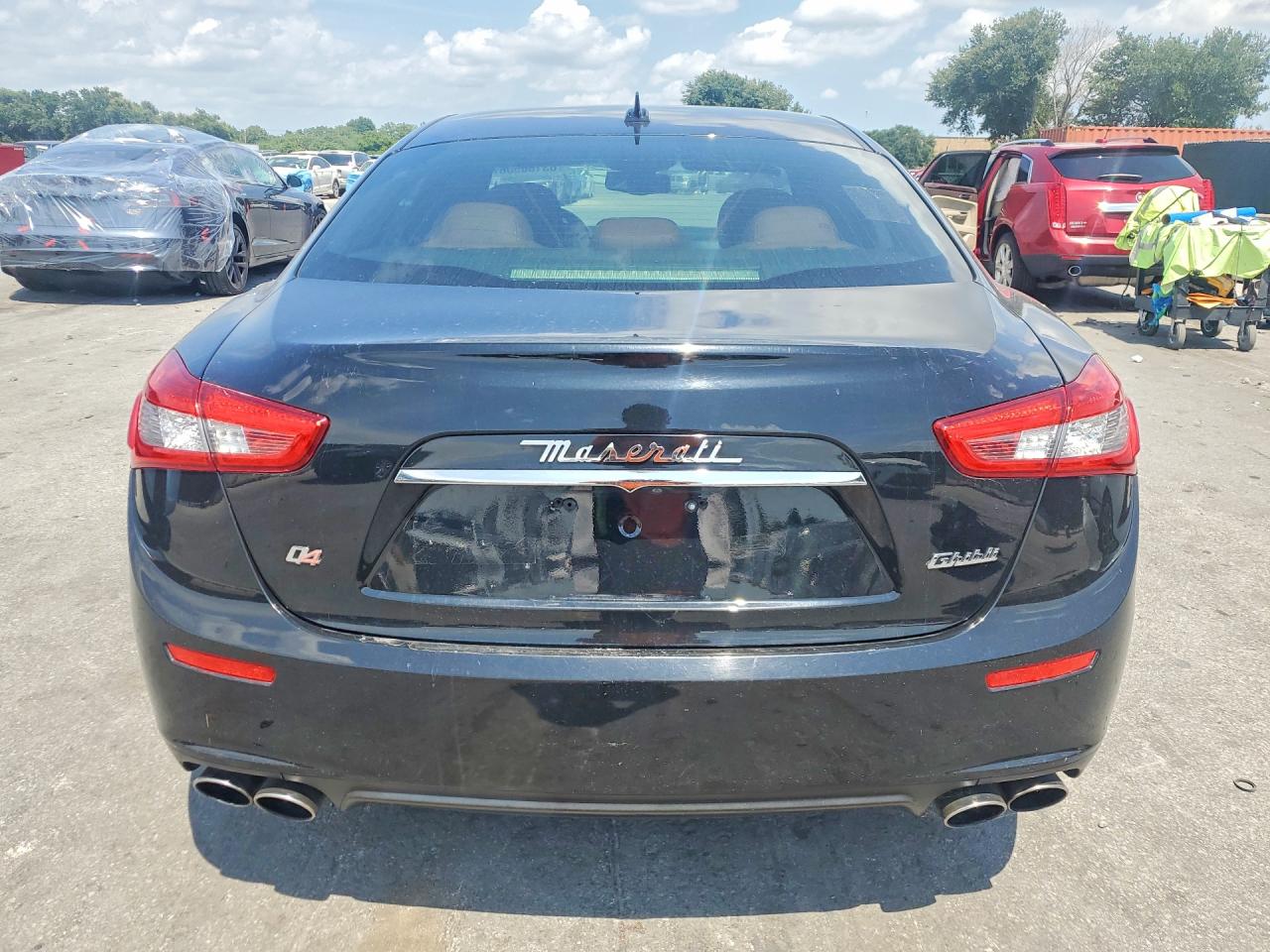 2014 Maserati Ghibli S Black vin: ZAM57RTAXE1090359