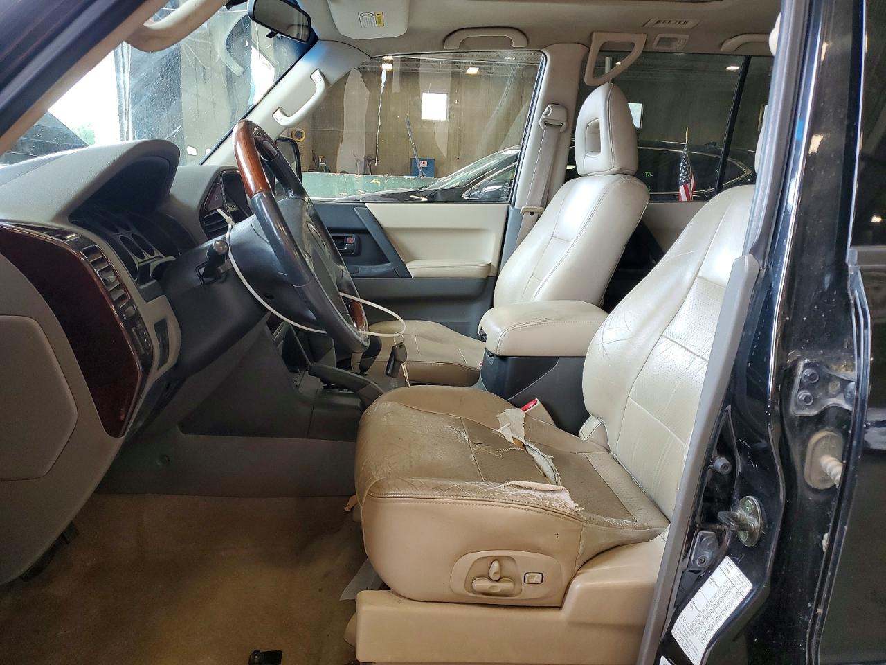 2002 Mitsubishi Montero Limited Black vin: JA4MW51RX2J003019