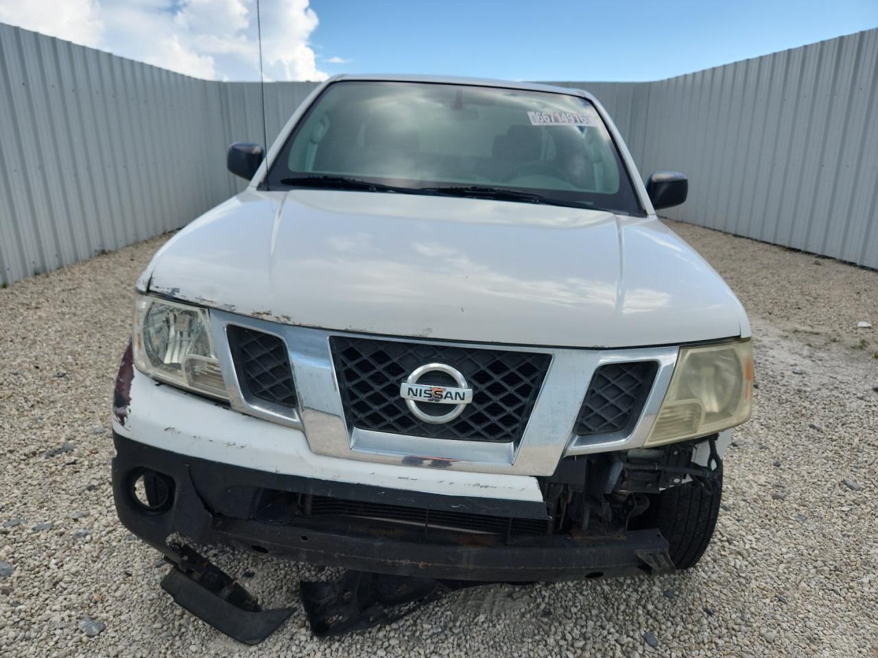 2015 Nissan Frontier S White vin: 1N6BD0CT8FN735479 Damage: Left Head Lamp, Faded, Repair Required