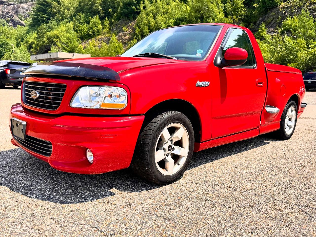 2002 Ford F150 Svt Lightning Red vin: 2FTZF07302CA64542