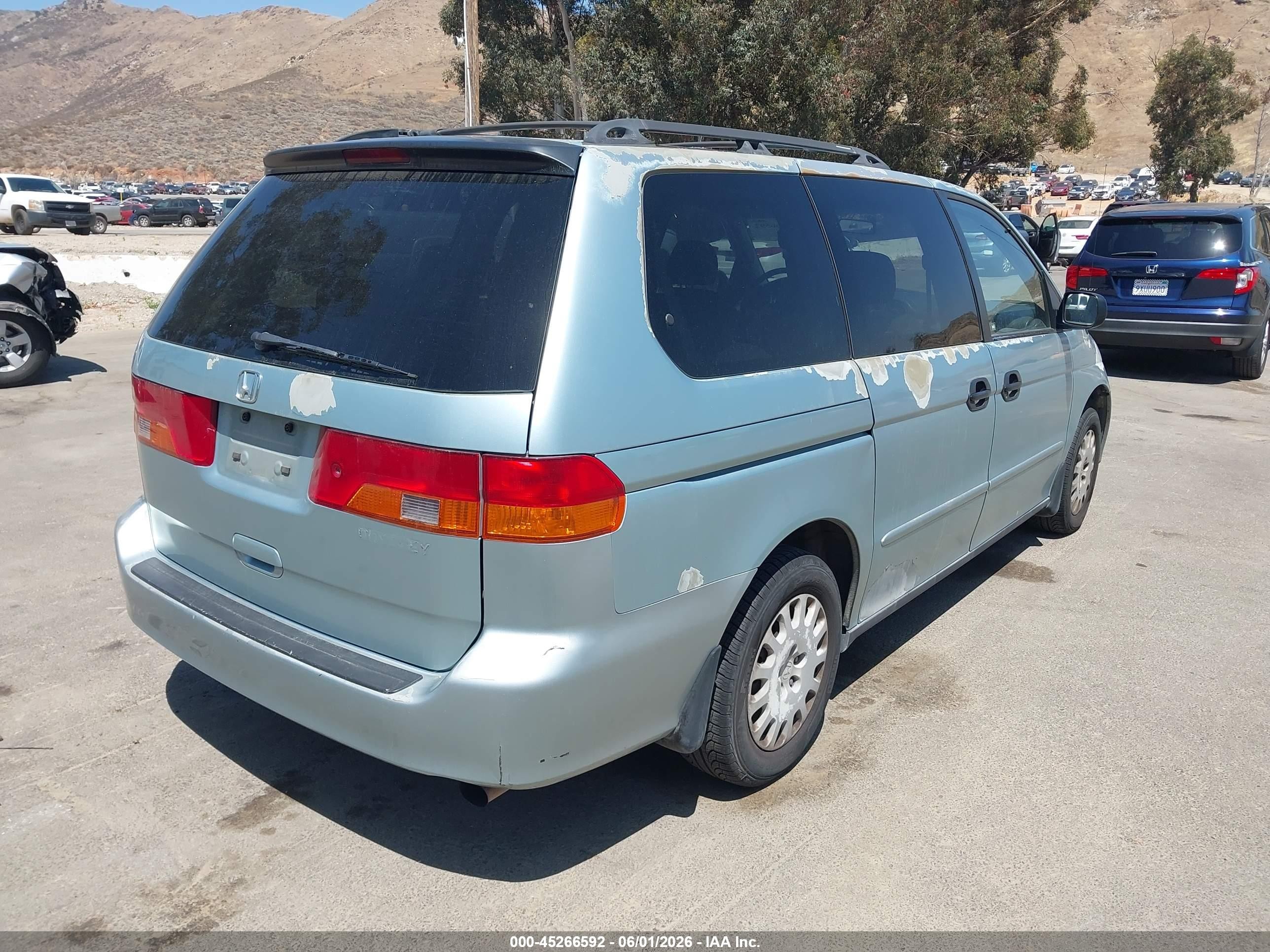 2003 Honda Odyssey Lx Silver vin: 5FNRL18593B090338