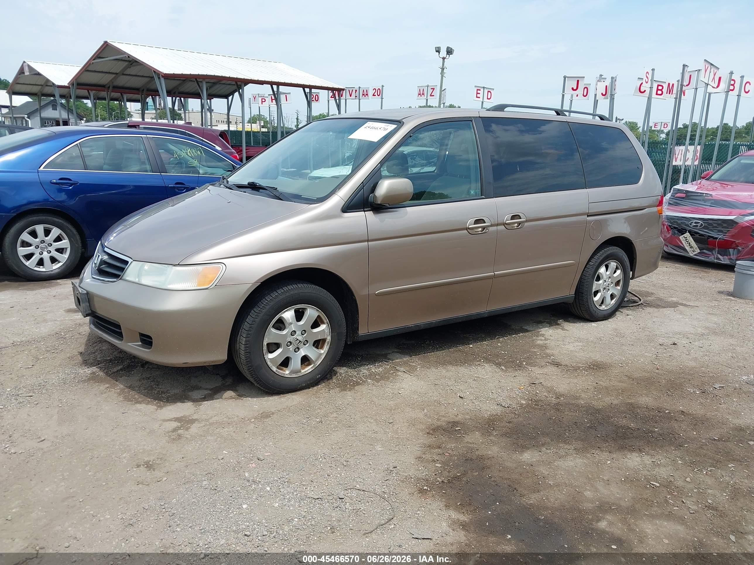 2004 Honda Odyssey Ex Gold vin: 5FNRL18634B079099