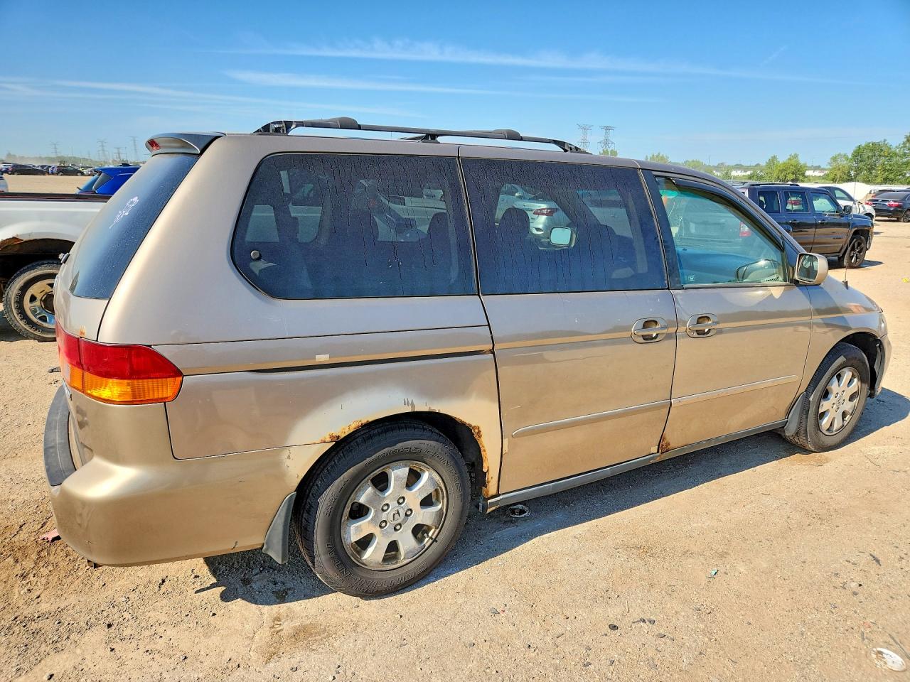 2004 Honda Odyssey Ex Gold vin: 5FNRL18664B049479