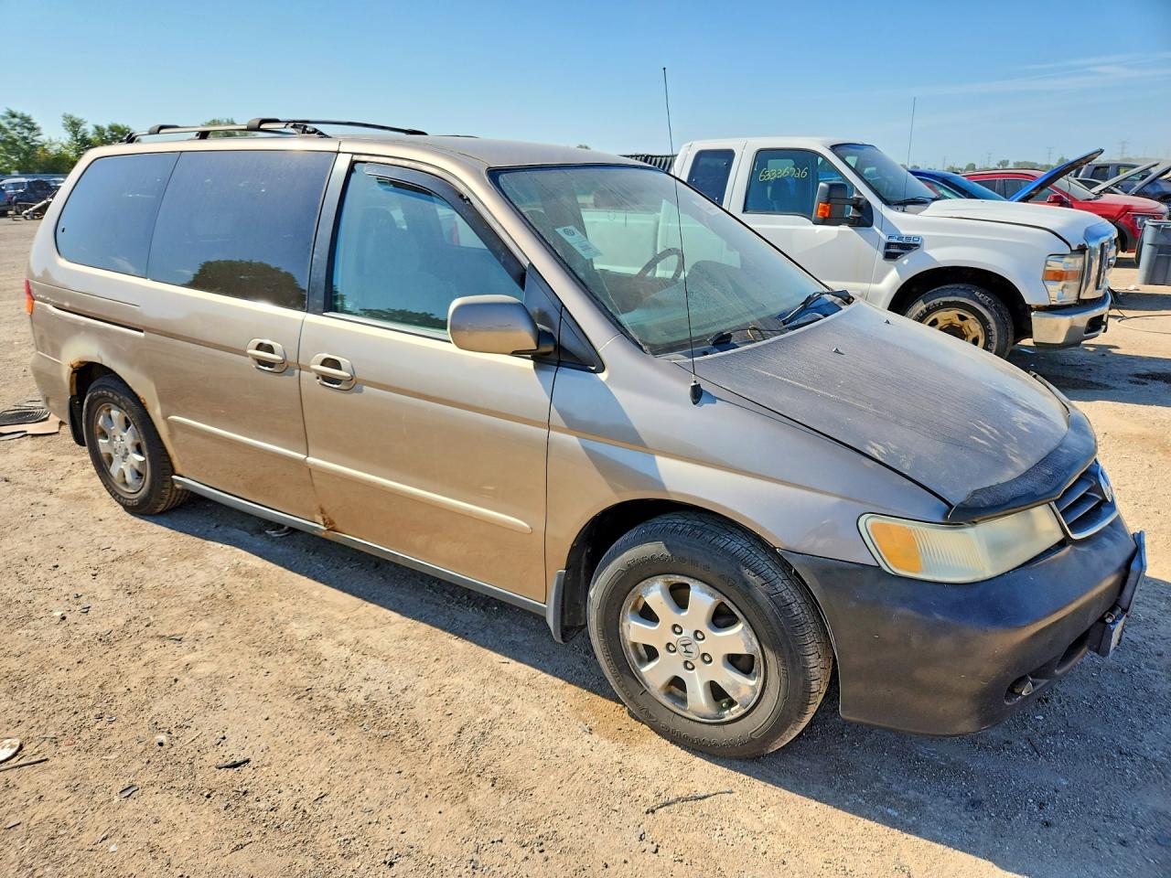 2004 Honda Odyssey Ex Gold vin: 5FNRL18664B049479