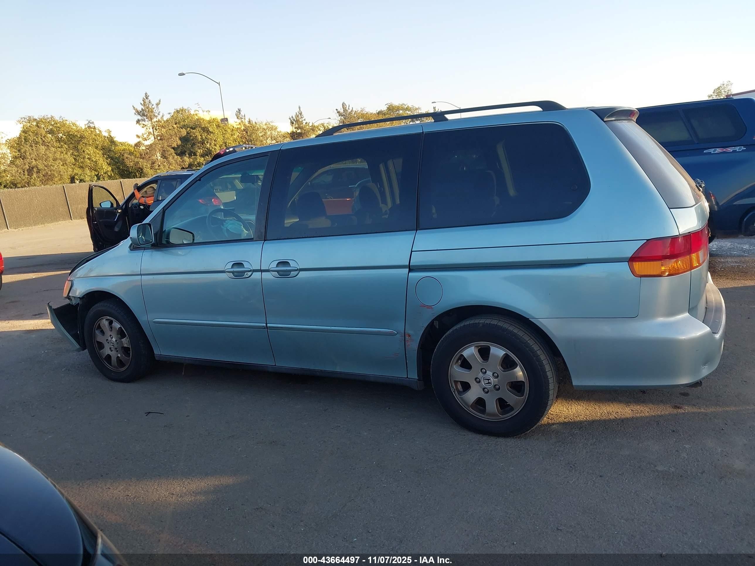 2004 Honda Odyssey Ex Light Blue vin: 5FNRL18674B067019