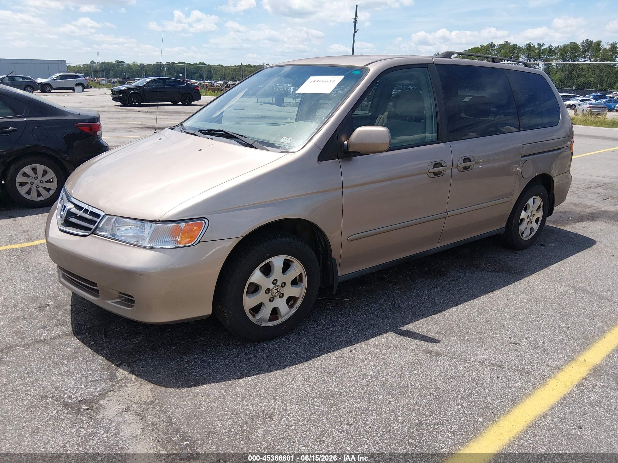 2004 Honda Odyssey Ex Tan vin: 5FNRL18674B082877