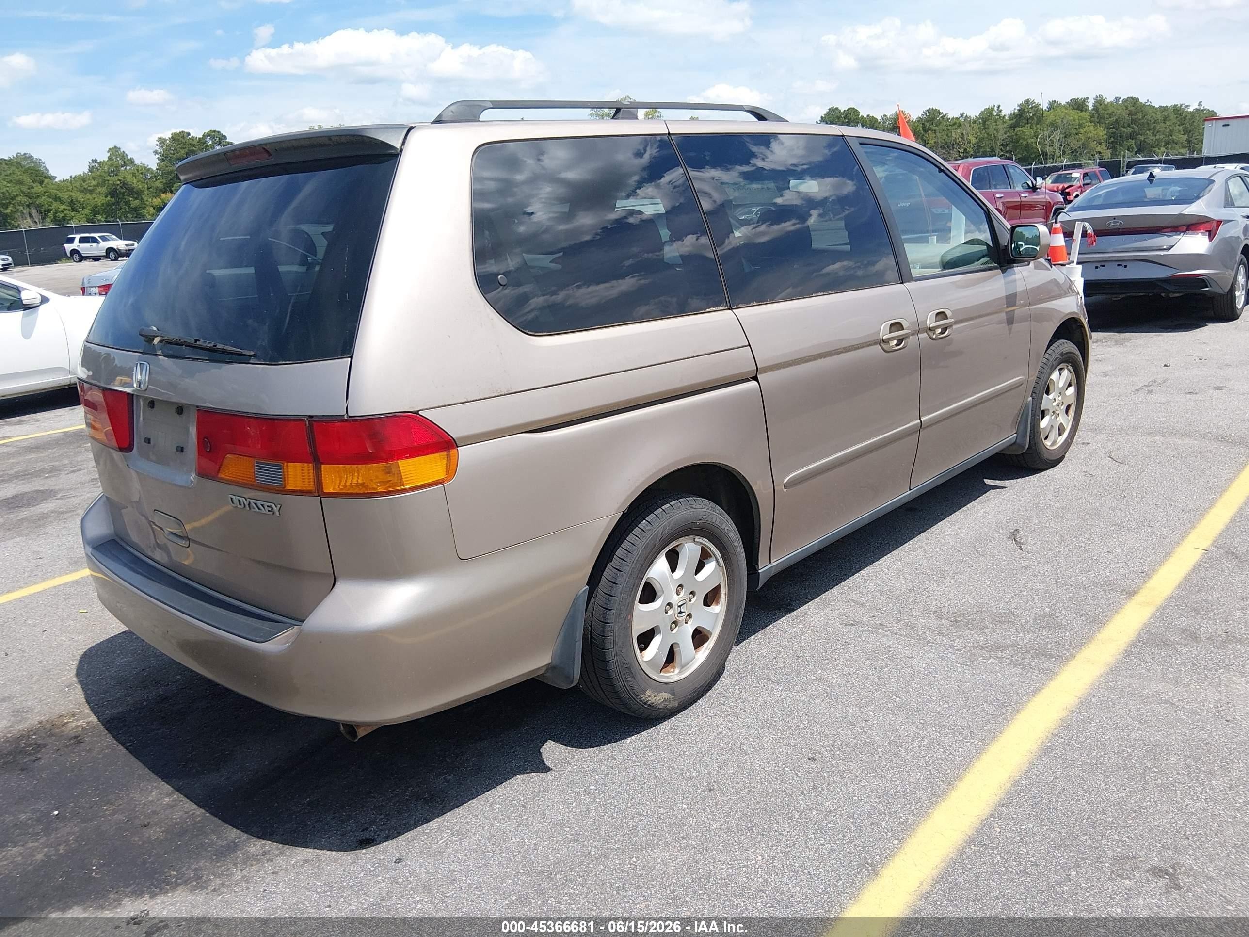 2004 Honda Odyssey Ex Tan vin: 5FNRL18674B082877