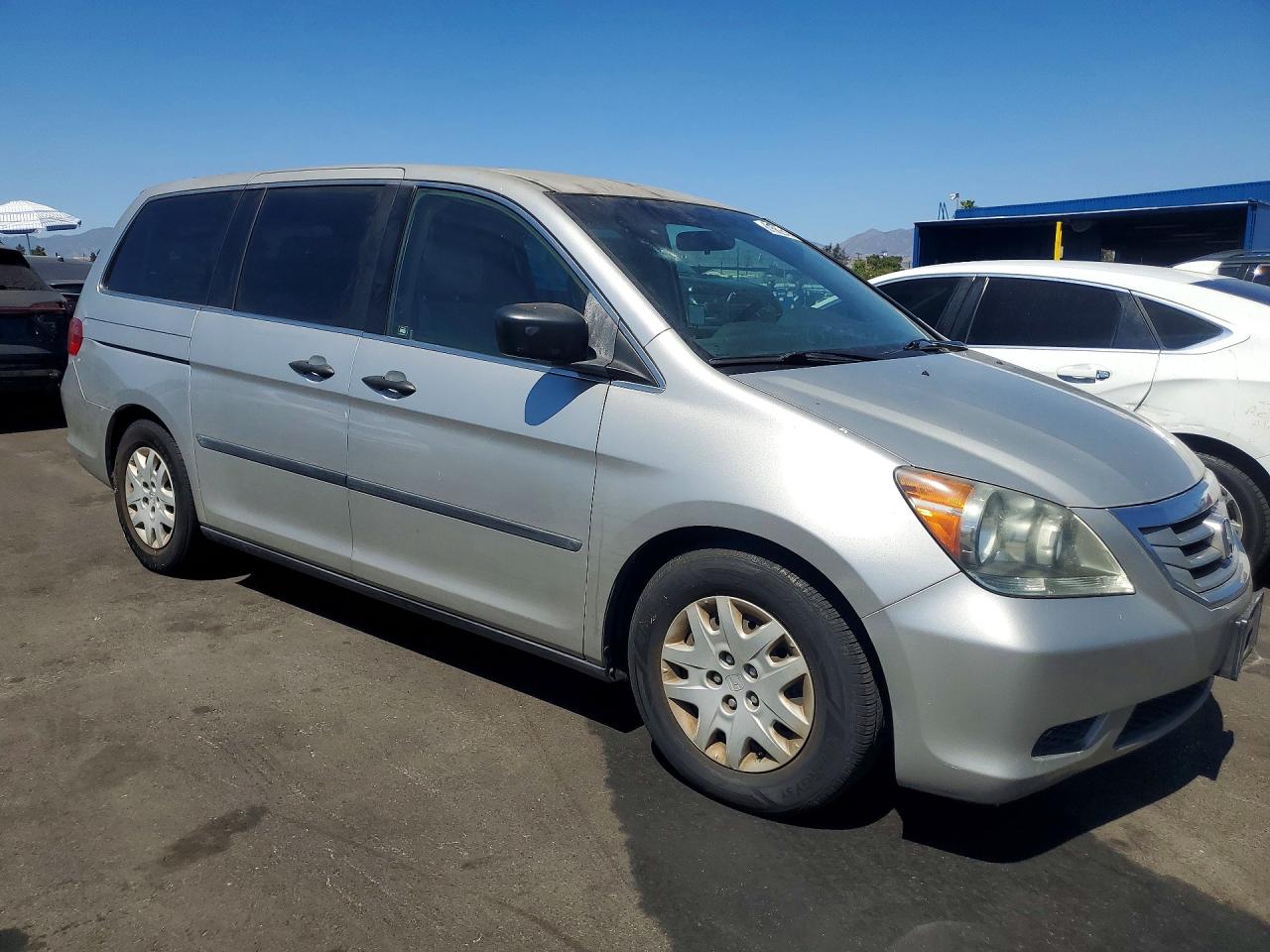 2009 Honda Odyssey Lx Silver vin: 5FNRL38269B028387