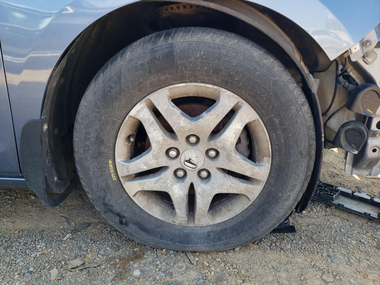 2006 Honda Odyssey Exl Blue vin: 5FNRL38736B102498 Damage: Right Front Wheel, Corrosion, > 12 Inches