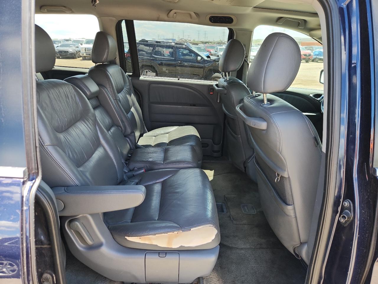 2007 Honda Odyssey Exl Blue vin: 5FNRL38737B010793 Damage: Right Rear Seat, Torn, > 12 Inches