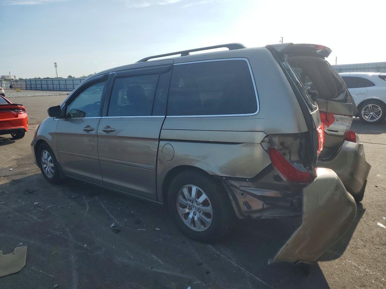 2010 Honda Odyssey Ex Tan vin: 5FNRL3H49AB107252
