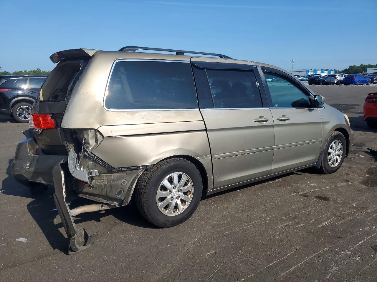 2010 Honda Odyssey Ex Tan vin: 5FNRL3H49AB107252