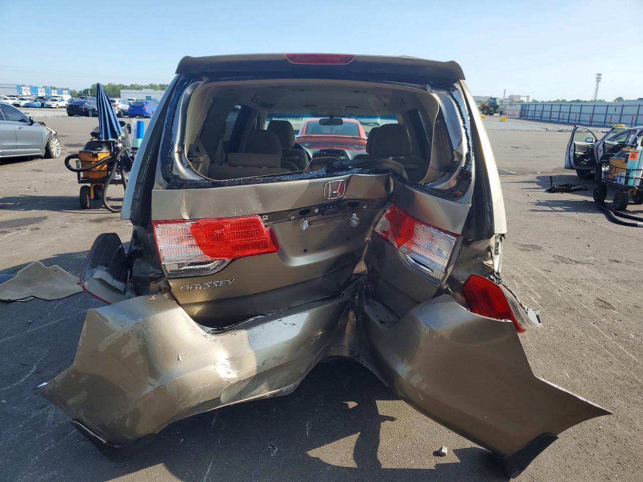 2010 Honda Odyssey Ex Tan vin: 5FNRL3H49AB107252