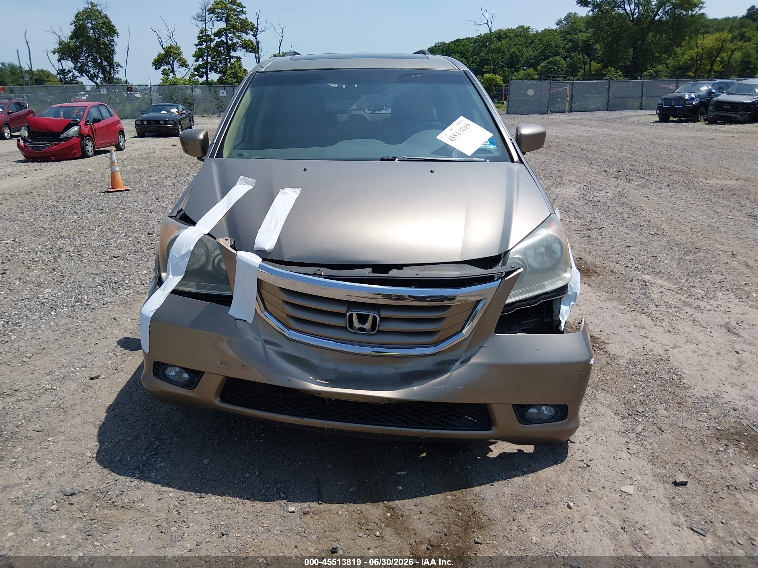 2010 Honda Odyssey Touring Tan vin: 5FNRL3H92AB004928