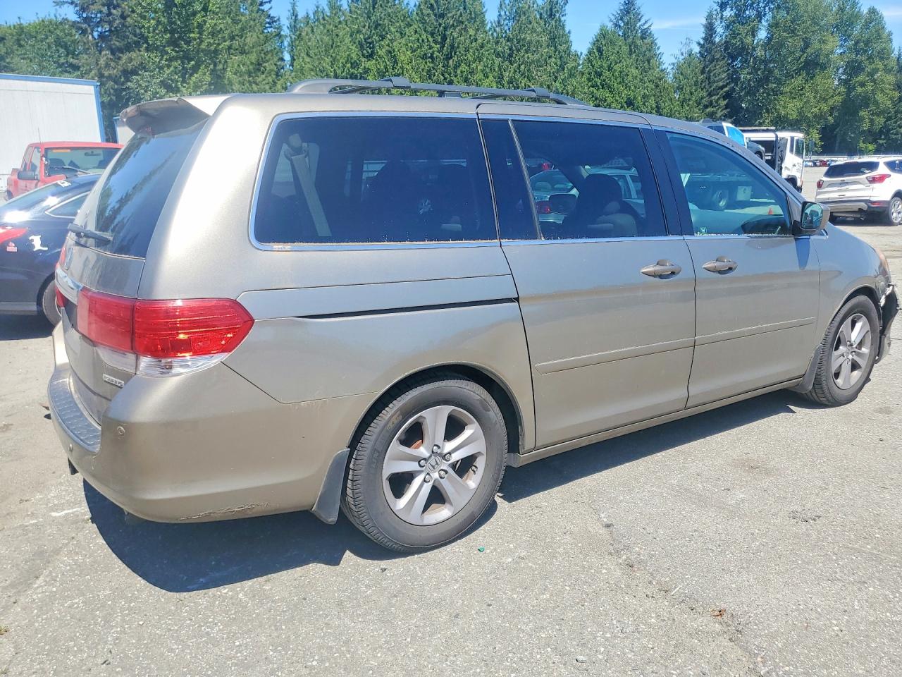 2010 Honda Odyssey Touring Желто-коричневый vin: 5FNRL3H96AB004902