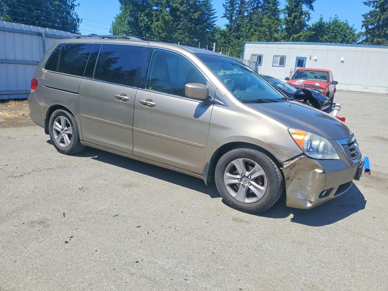 2010 Honda Odyssey Touring Желто-коричневый vin: 5FNRL3H96AB004902