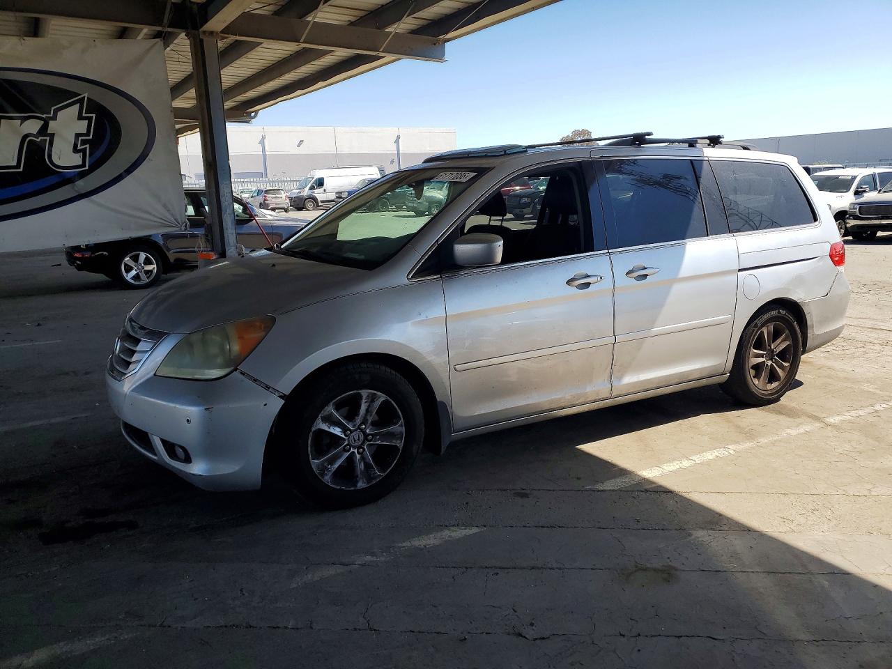 2010 Honda Odyssey Touring Silver vin: 5FNRL3H96AB063027