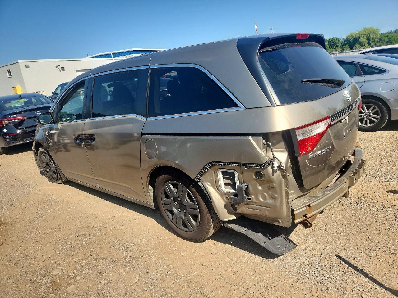 2011 Honda Odyssey Lx Tan vin: 5FNRL5H21BB508726