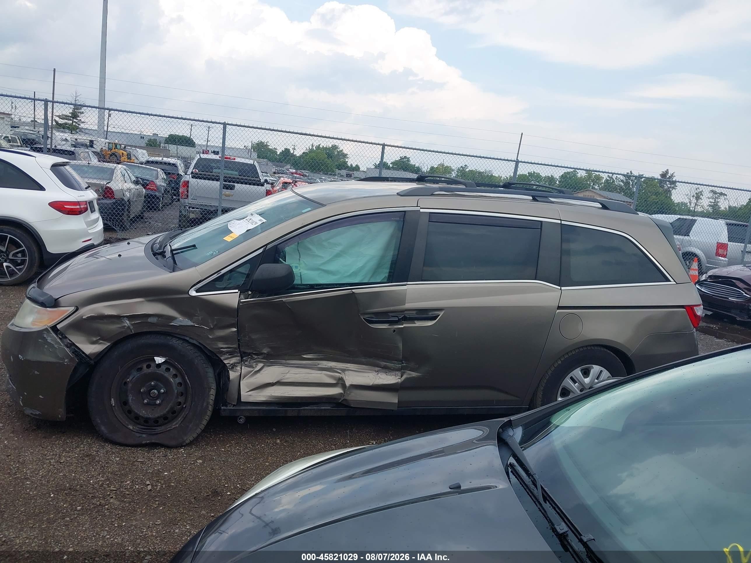 2012 Honda Odyssey Lx Tan vin: 5FNRL5H23CB061205