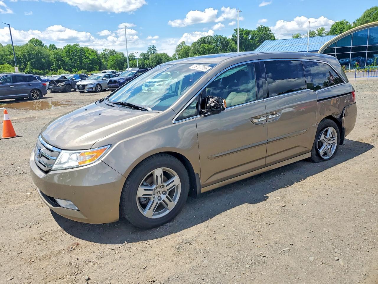 2012 Honda Odyssey Touring Золотой vin: 5FNRL5H90CB029082