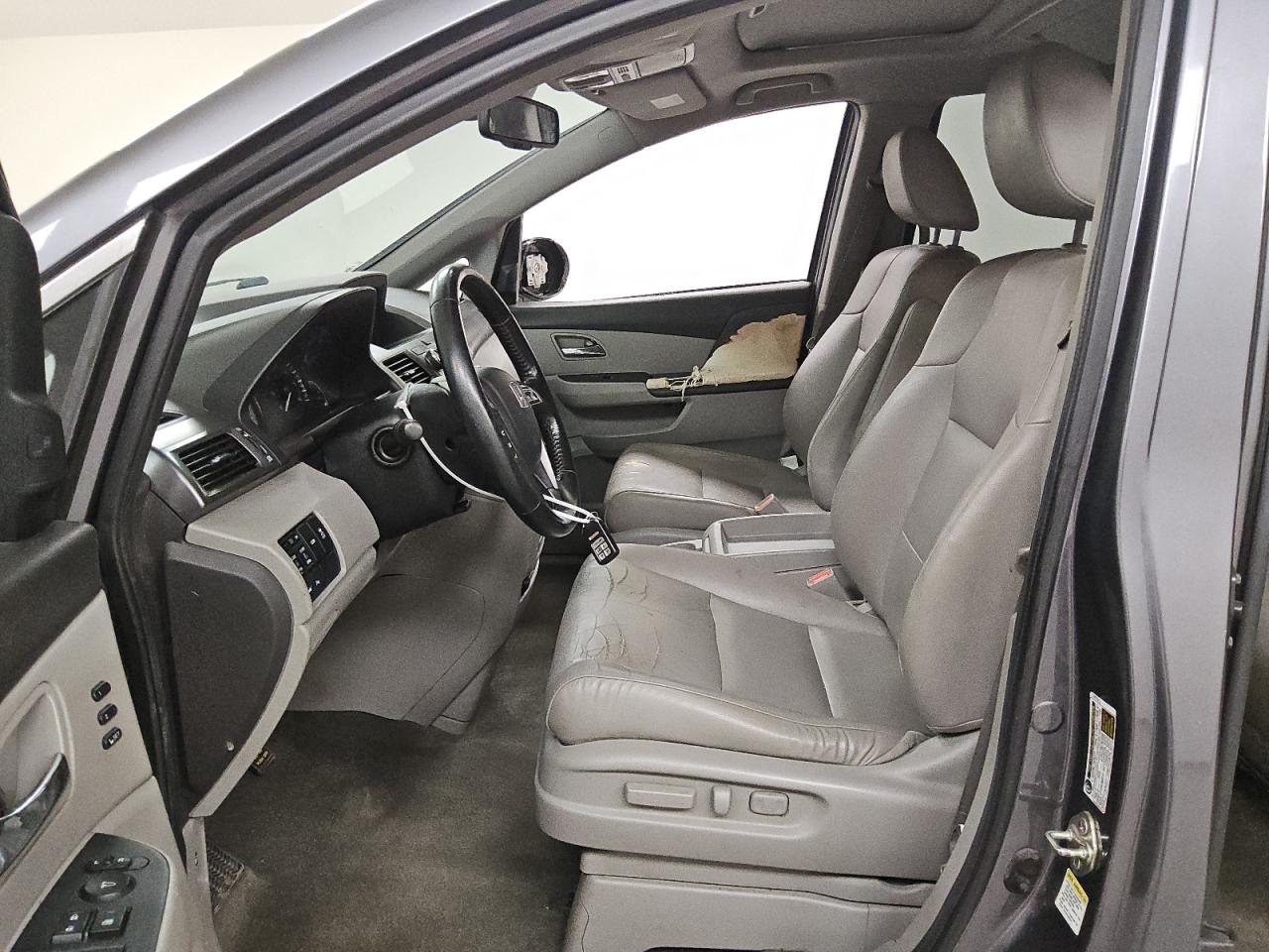 2014 Honda Odyssey Touring Gray vin: 5FNRL5H91EB094879 Damage: Left Front Seat, Worn, Replacement Required