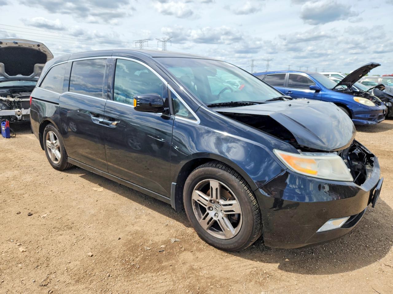 2012 Honda Odyssey Touring Black vin: 5FNRL5H97CB068929