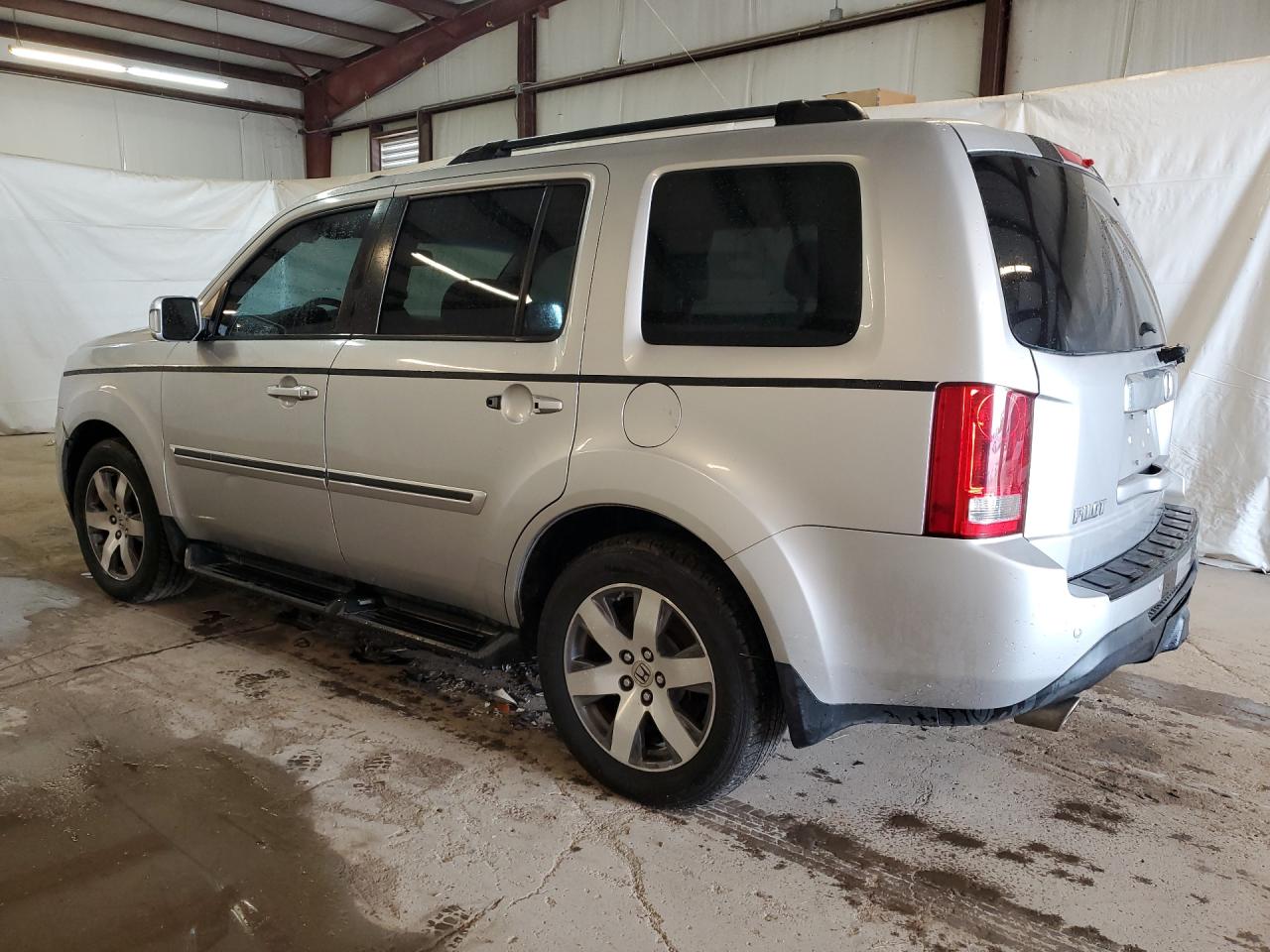 2015 Honda Pilot Touring Silver vin: 5FNYF3H93FB001031 Damage: Left Rear Door Handle, Missing, Replacement Required