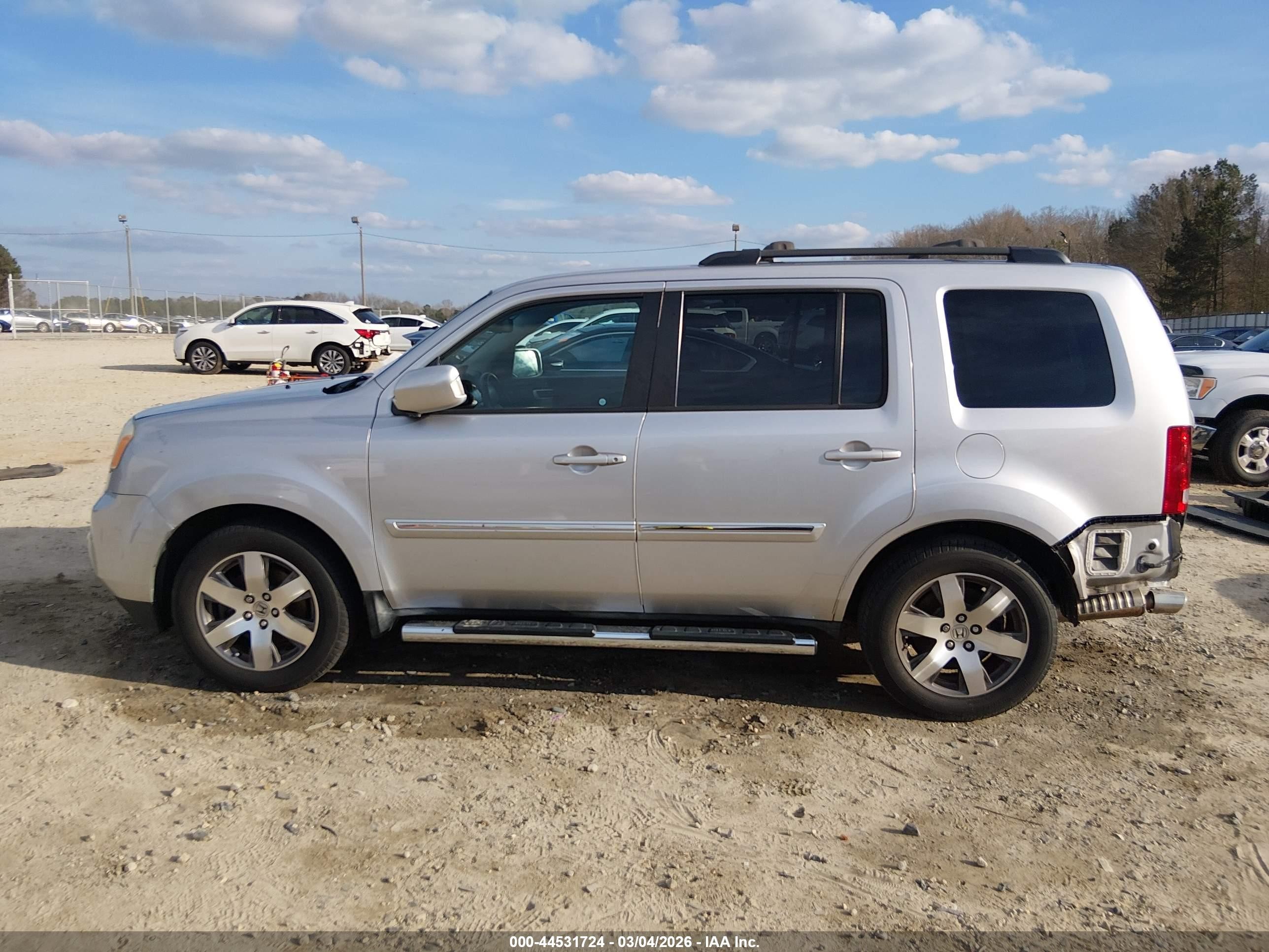 2015 Honda Pilot Touring Серебряный vin: 5FNYF3H94FB008439