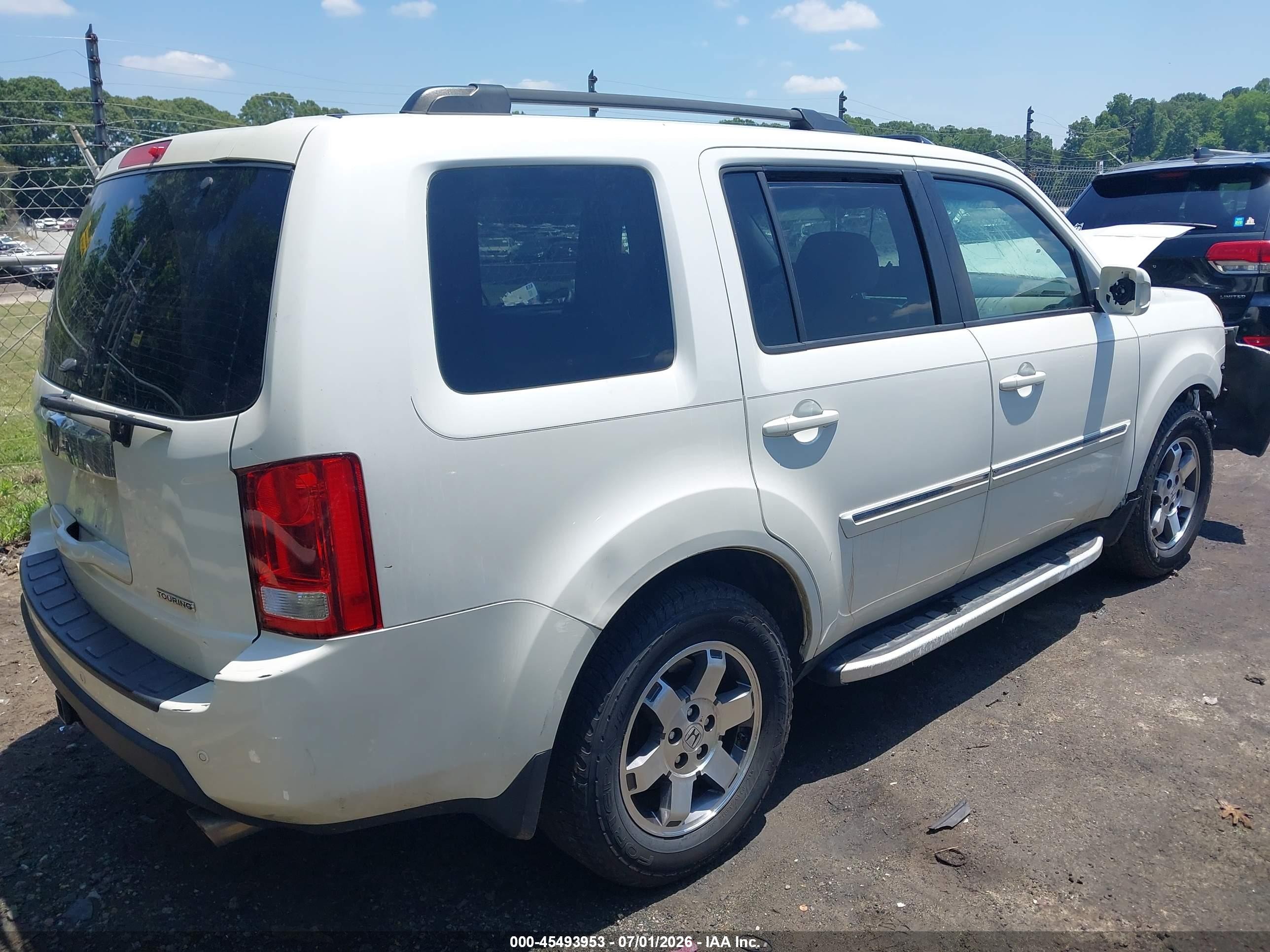 2011 Honda Pilot Touring White vin: 5FNYF3H9XBB057428