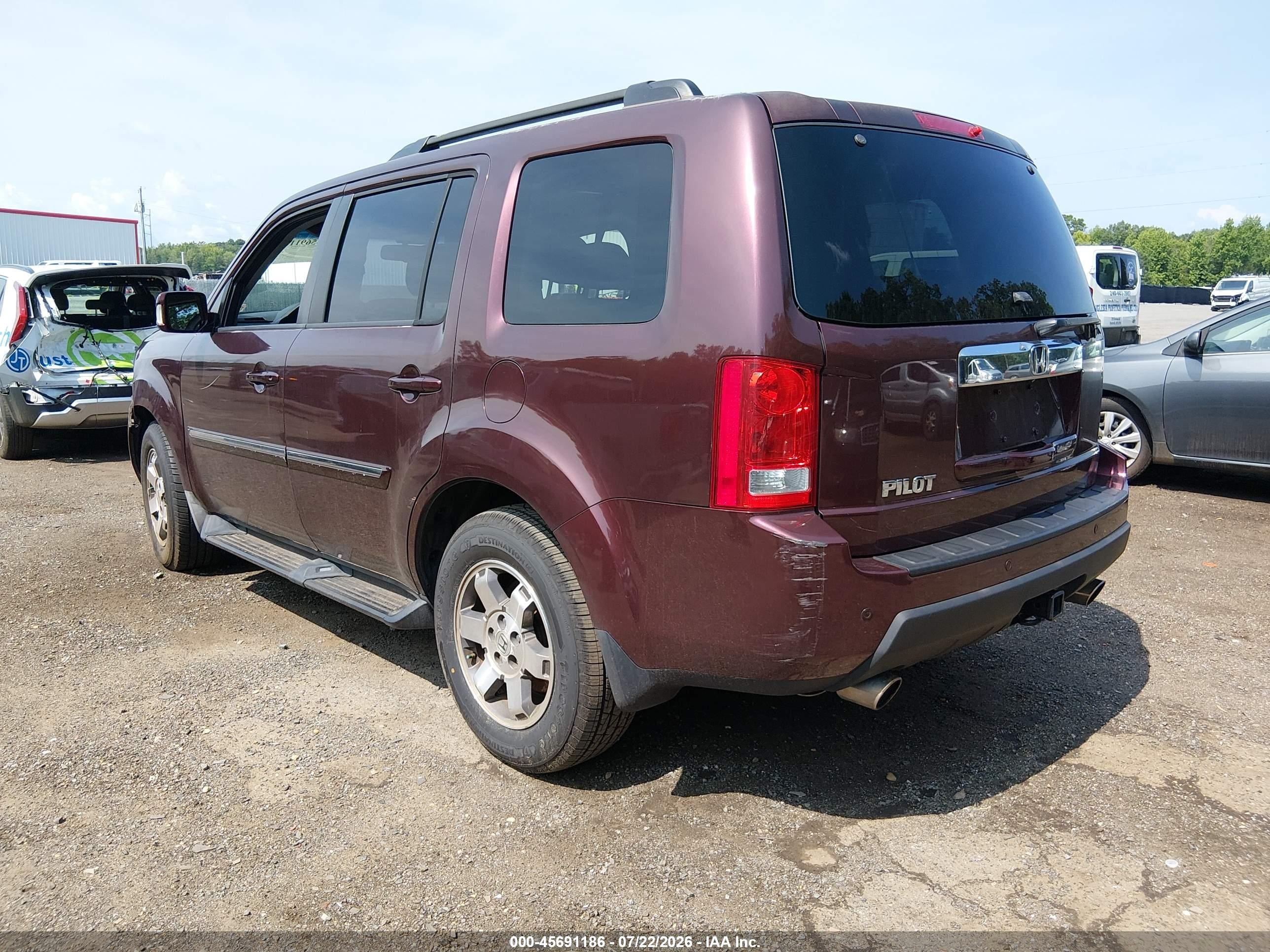 2009 Honda Pilot Touring Burgundy vin: 5FNYF48819B045319