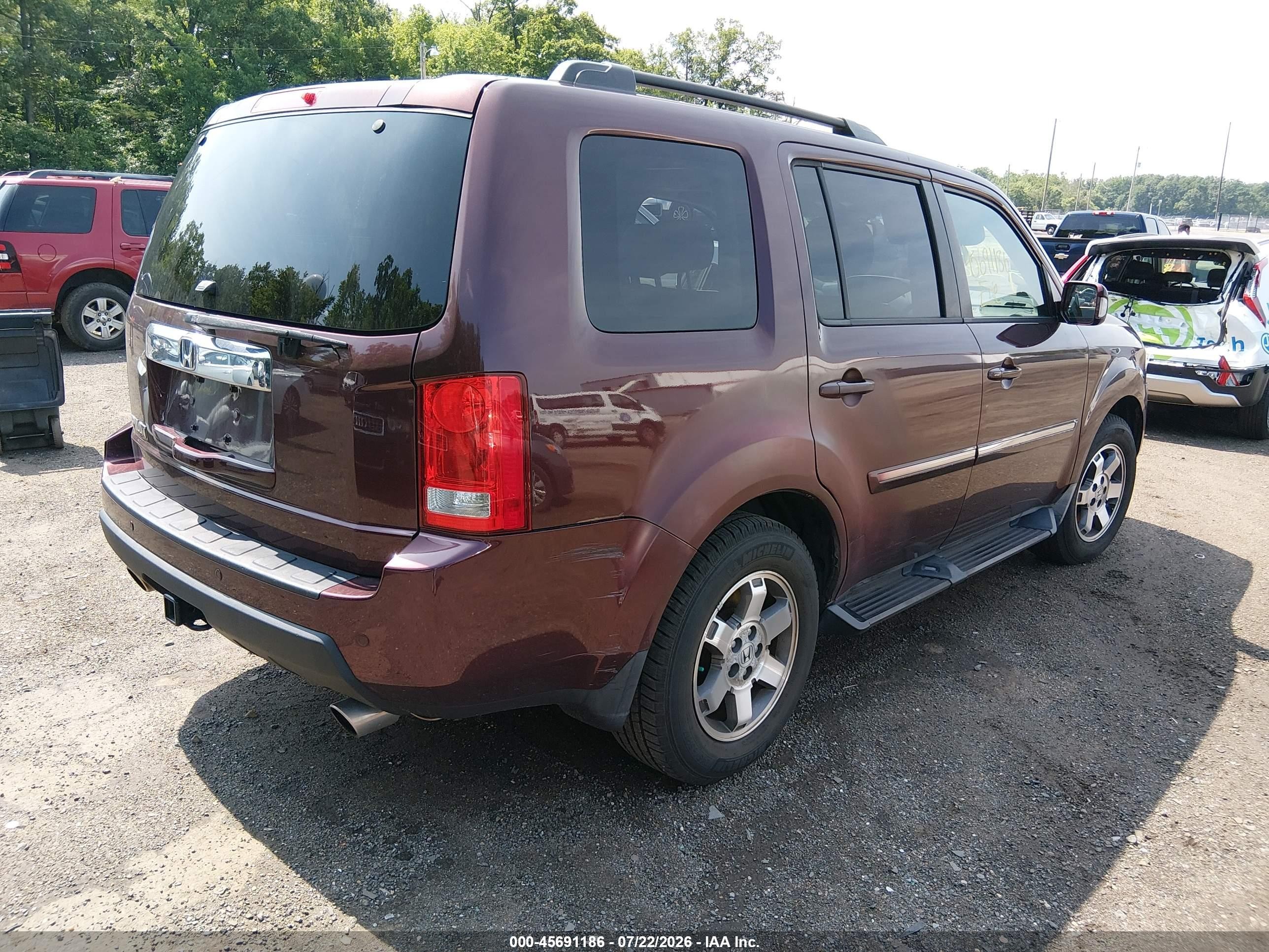 2009 Honda Pilot Touring Burgundy vin: 5FNYF48819B045319