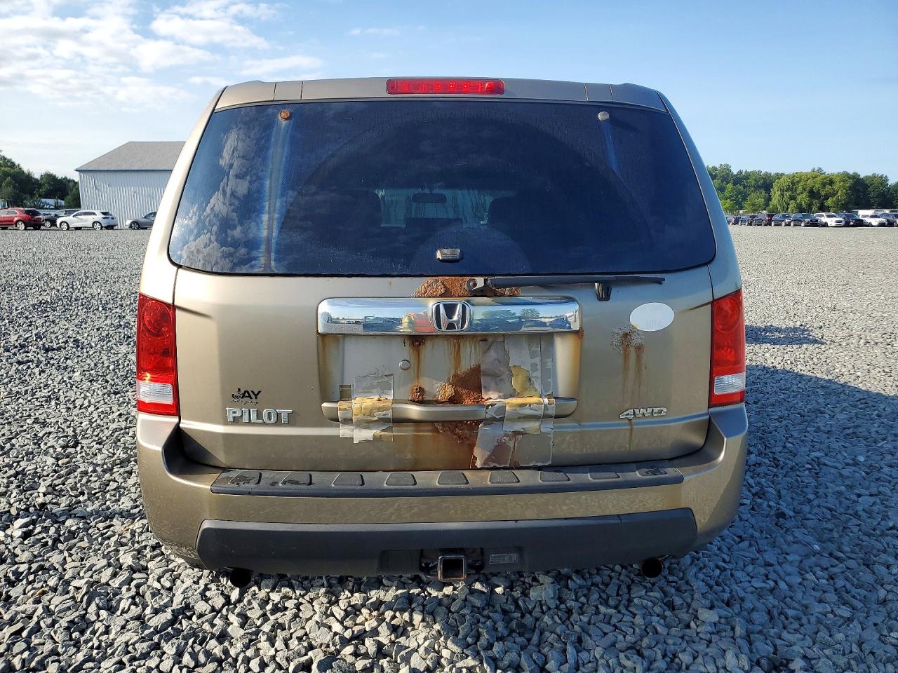 2011 Honda Pilot Lx Tan vin: 5FNYF4H25BB047950