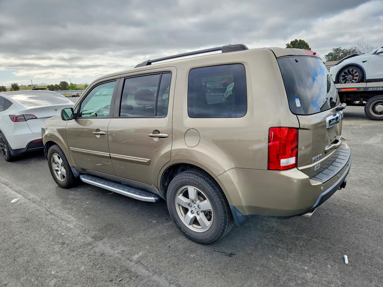 2011 Honda Pilot Ex Gold vin: 5FNYF4H49BB105592