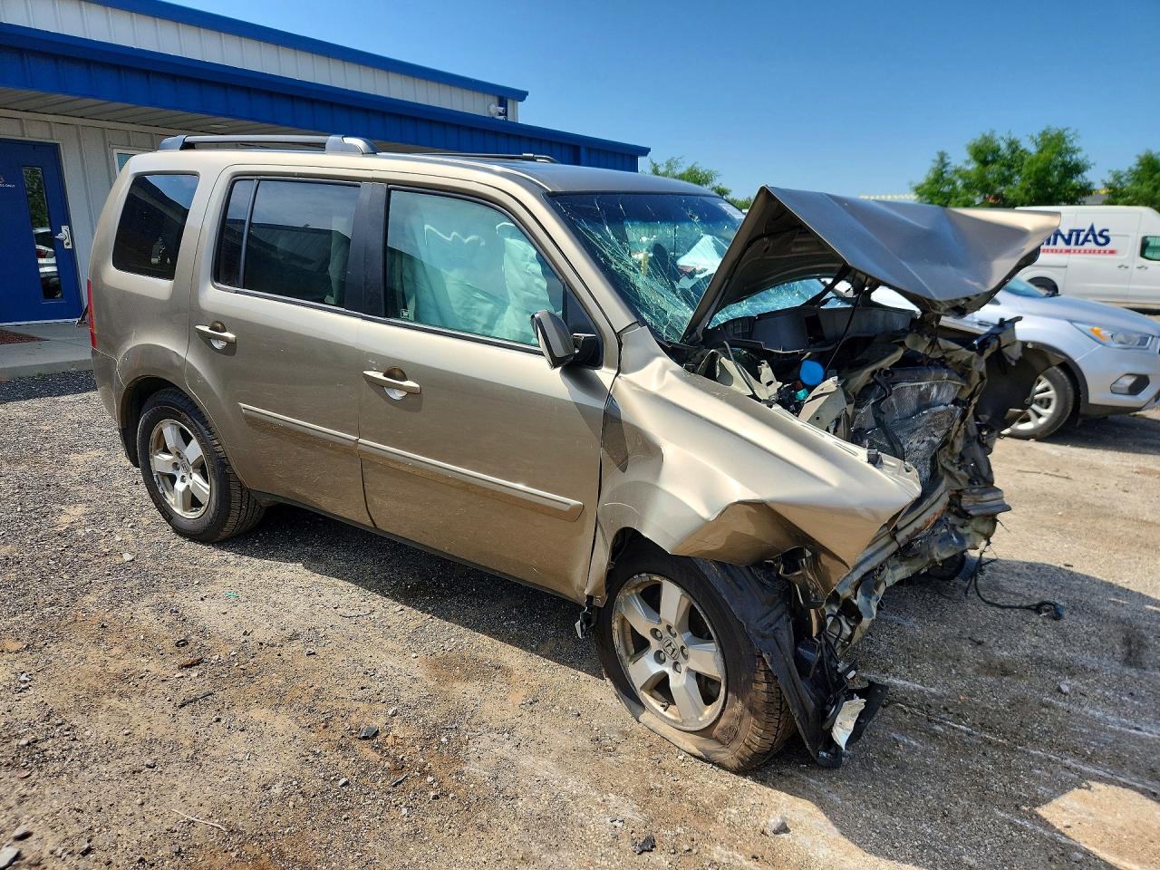 2011 Honda Pilot Exln Tan vin: 5FNYF4H72BB044063