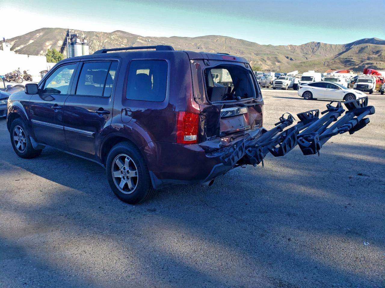 2010 Honda Pilot Touring Burgundy vin: 5FNYF4H90AB024796