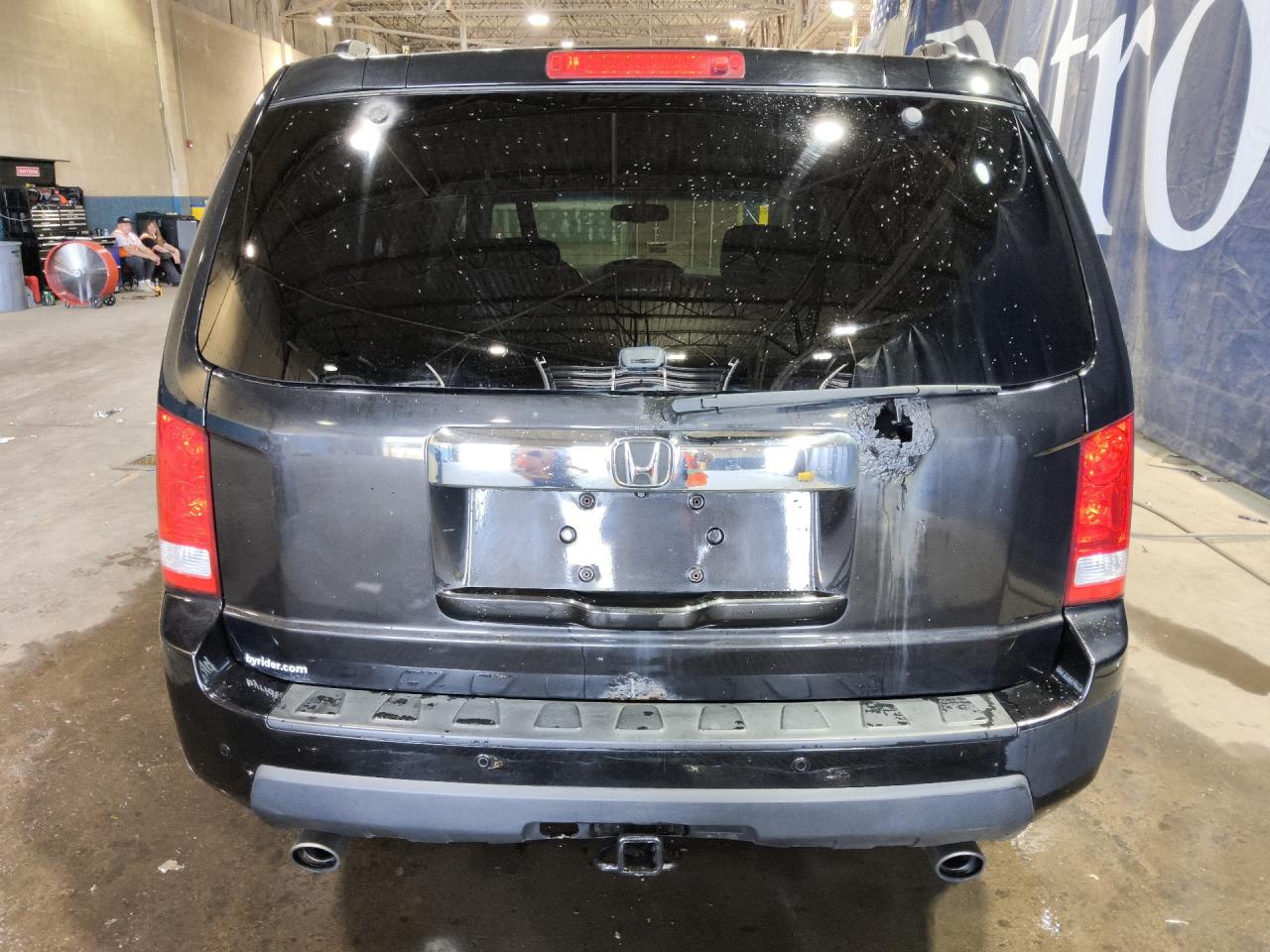 2010 Honda Pilot Touring Black vin: 5FNYF4H91AB502272 Damage: Lift Gate, Rust, > 12 Inches