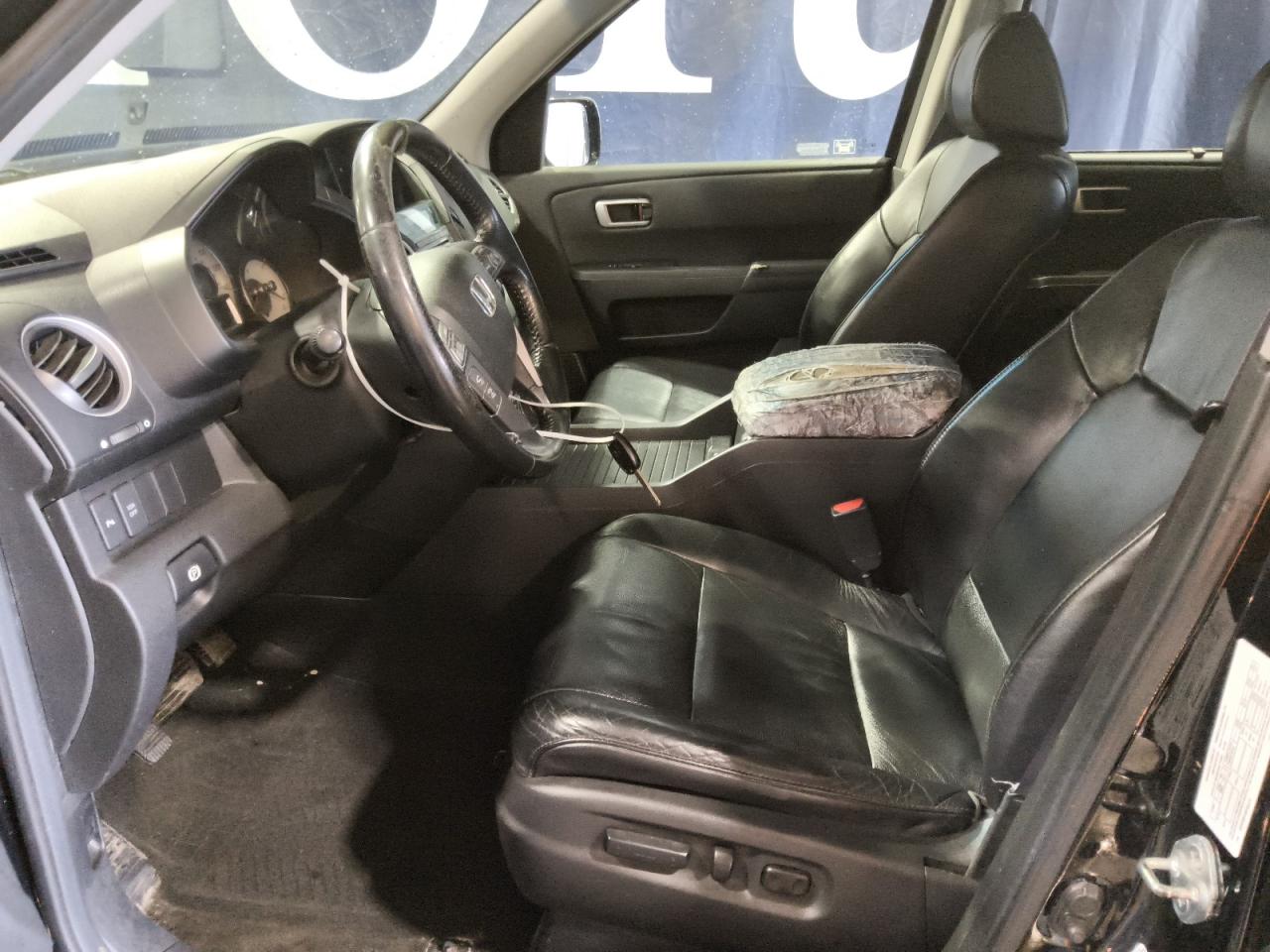2010 Honda Pilot Touring Black vin: 5FNYF4H91AB502272 Damage: Console Cover, Torn, > 12 Inches