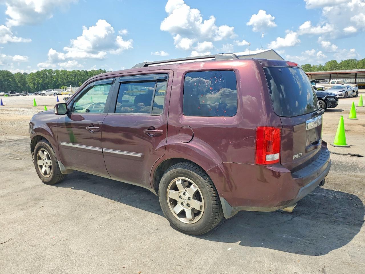 2010 Honda Pilot Touring Burgundy vin: 5FNYF4H92AB013590