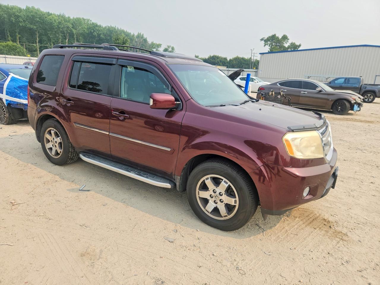 2011 Honda Pilot Touring Burgundy vin: 5FNYF4H94BB019053