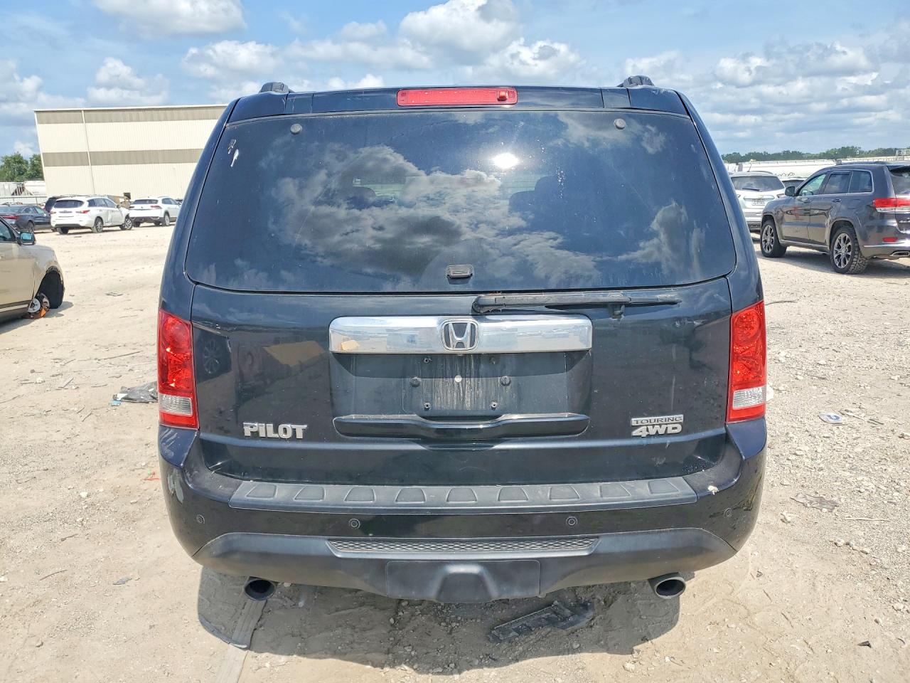 2012 Honda Pilot Touring Черный vin: 5FNYF4H95CB081580