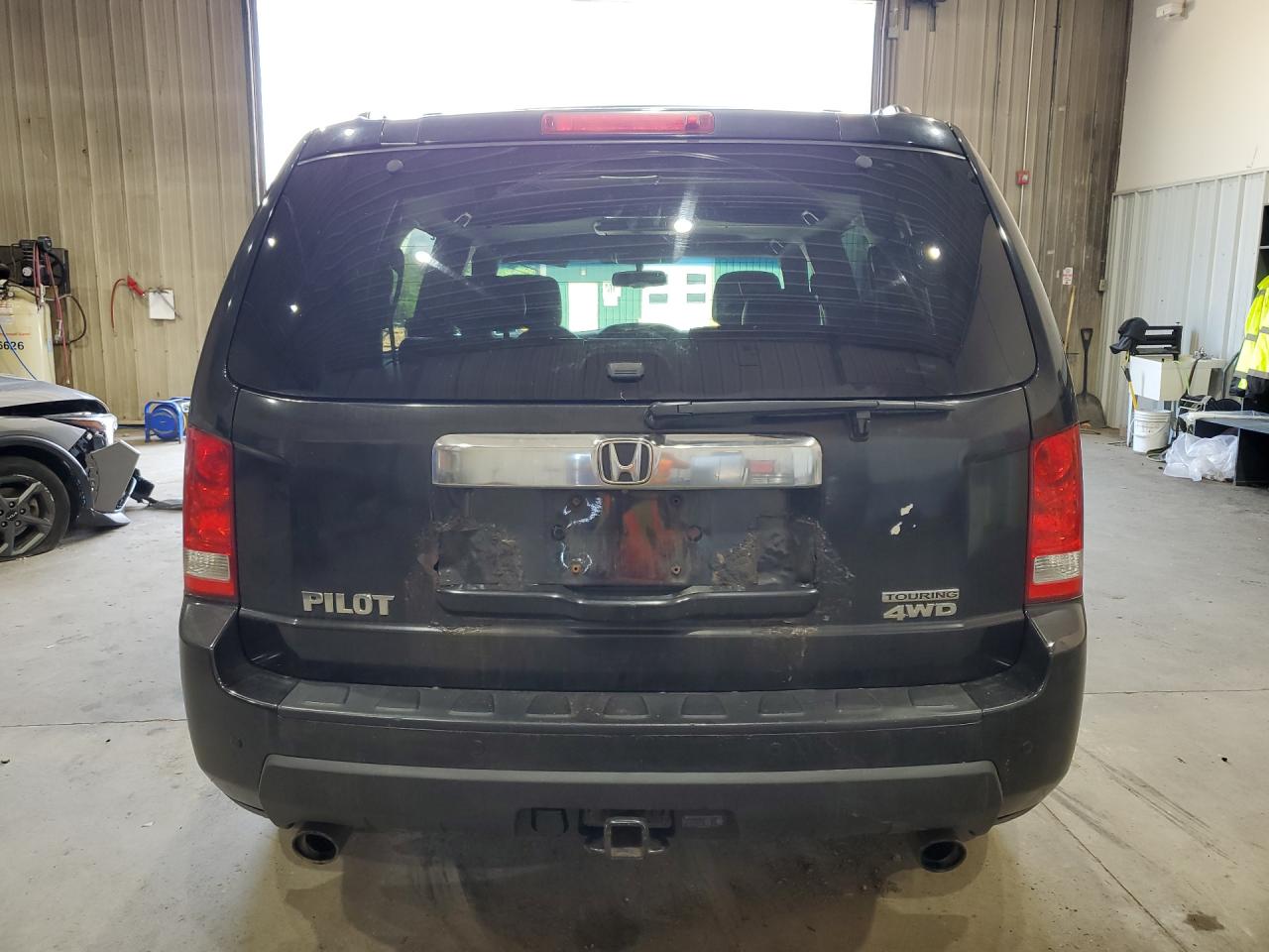 2011 Honda Pilot Touring Black vin: 5FNYF4H98BB028192 Damage: Lift Gate, Rust, > 12 Inches
