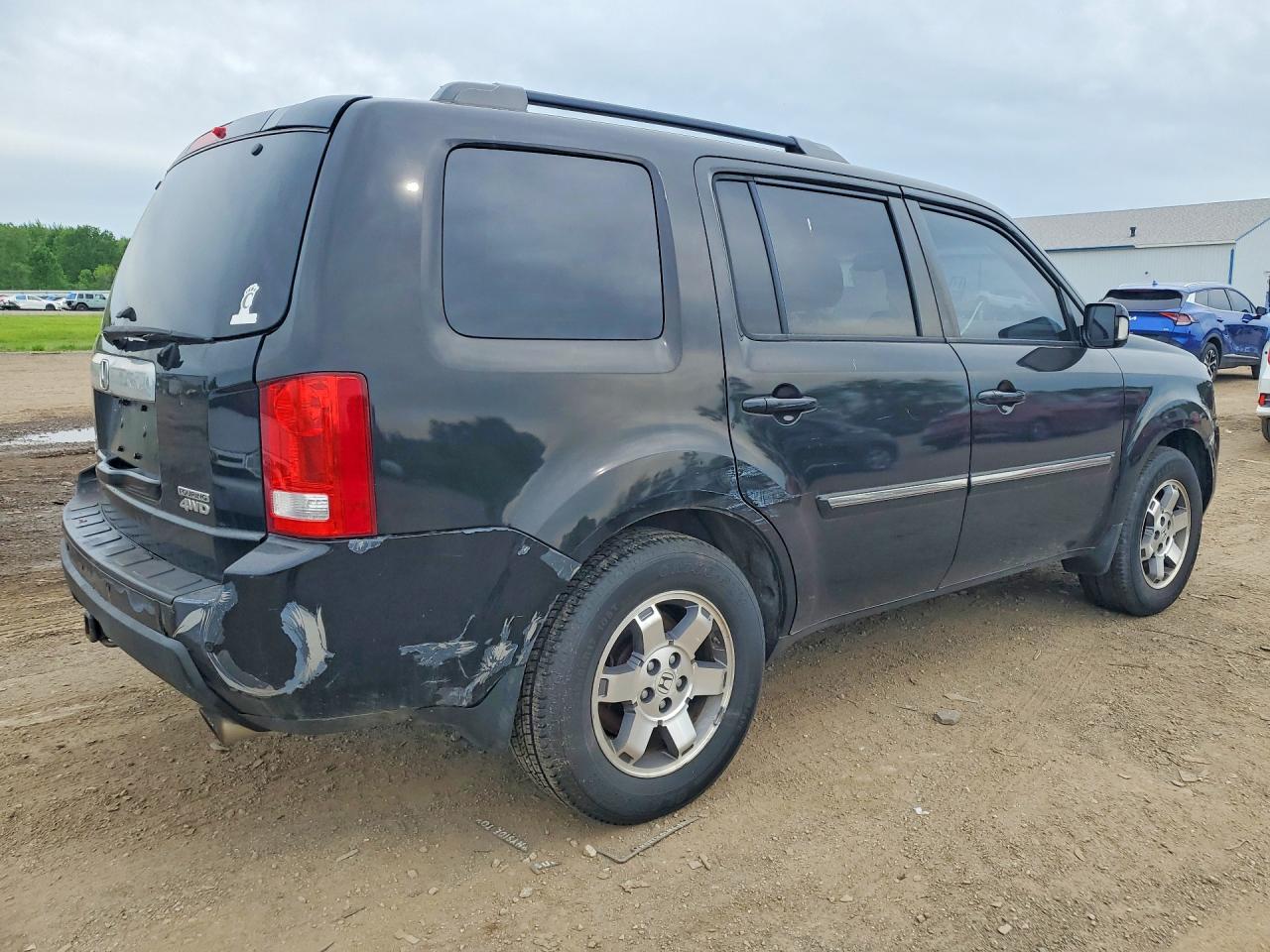 2011 Honda Pilot Touring Черный vin: 5FNYF4H9XBB096400