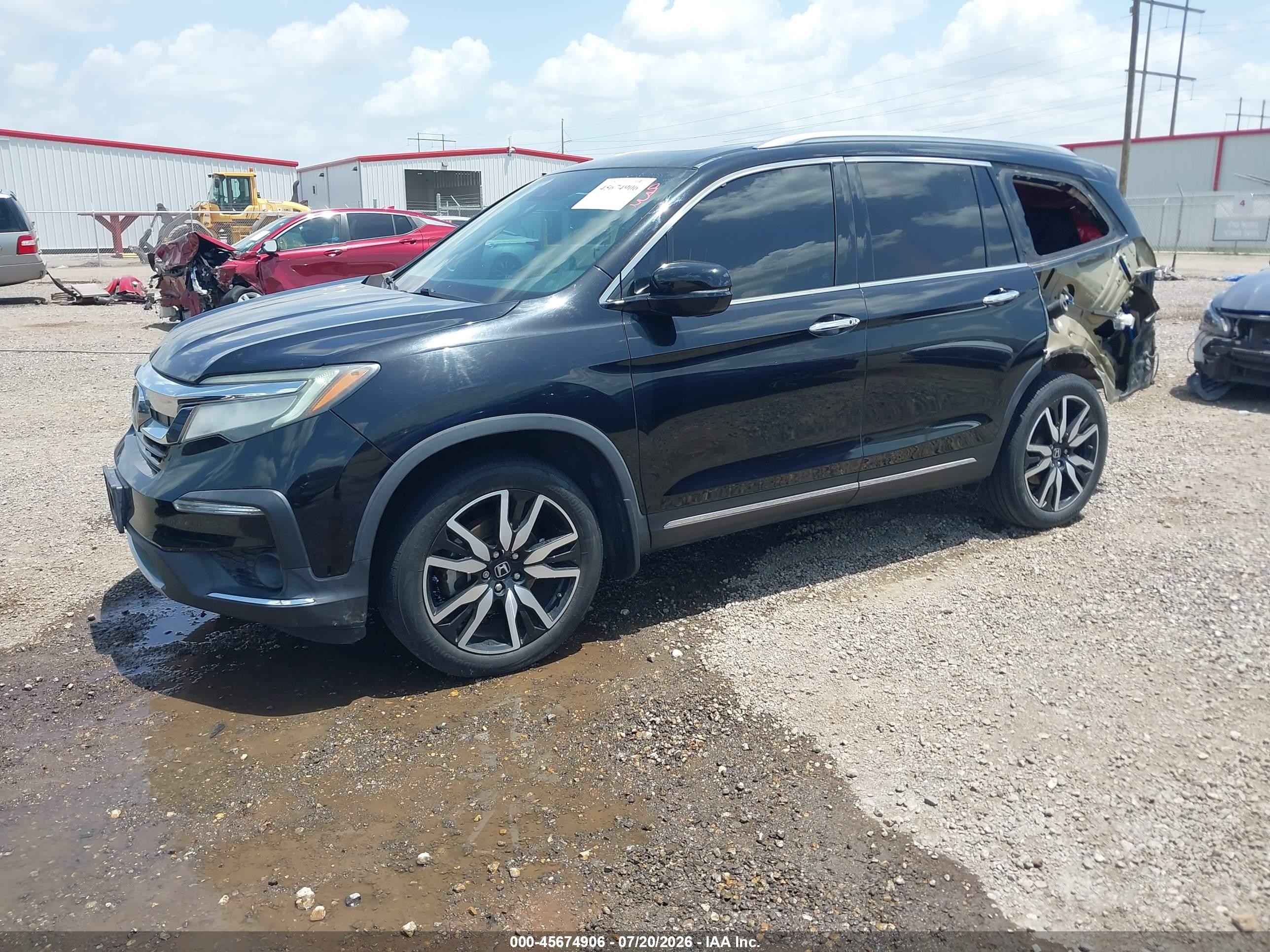 2019 Honda Pilot Touring Черный vin: 5FNYF5H99KB014257